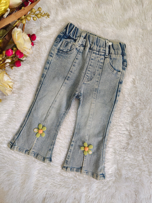 Denim jeans with flower at bottom