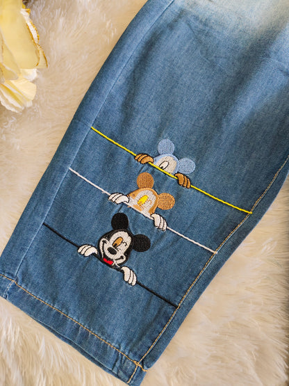 Pants with mickey design at bottom