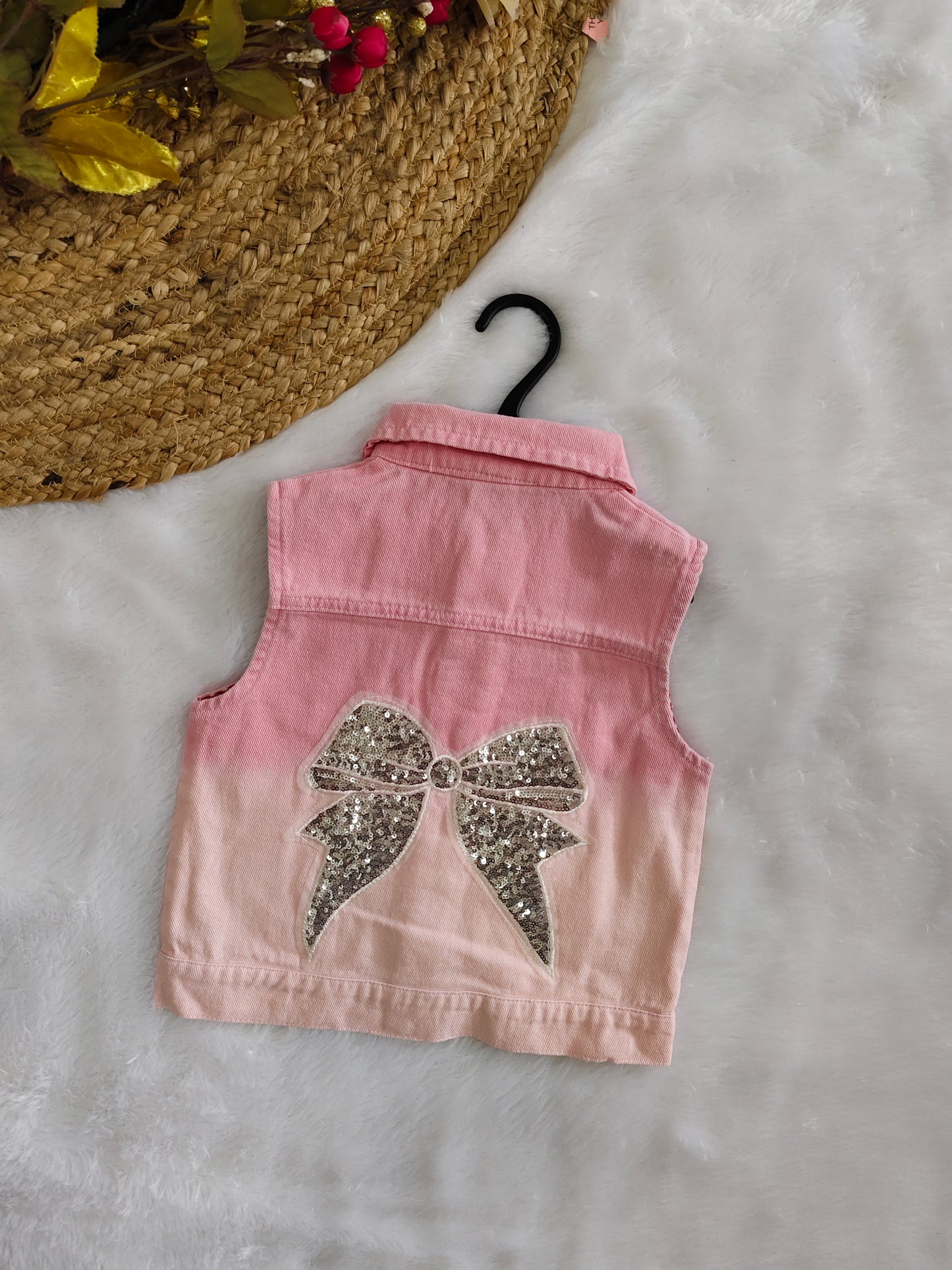 Denim jacket with bow design