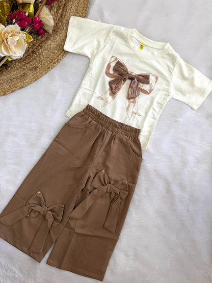 Partywear set with bow design at bottom