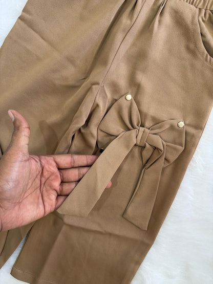 Partywear set with bow design at bottom