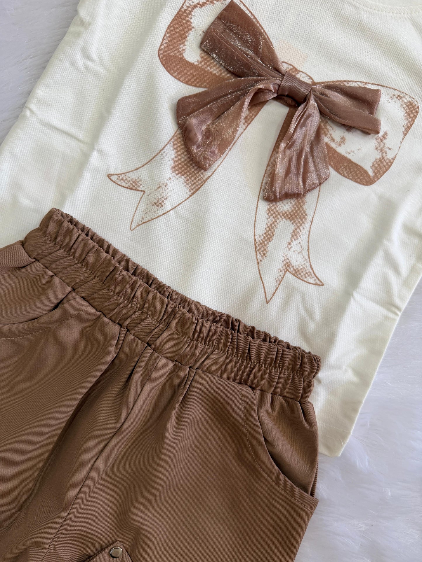 Partywear set with bow design at bottom