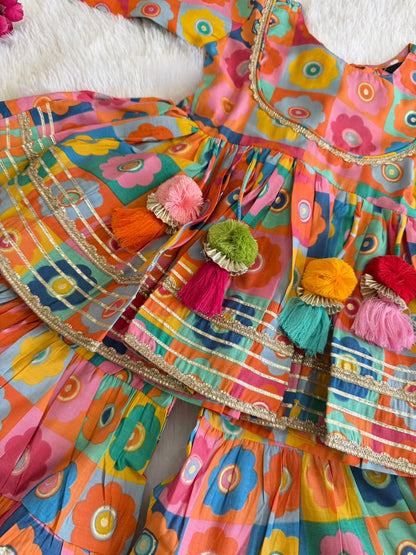Vibrant Checkered Floral Kurti & Sharara Set with Colorful Tassels