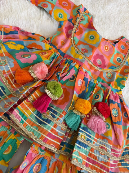 Vibrant Checkered Floral Kurti & Sharara Set with Colorful Tassels